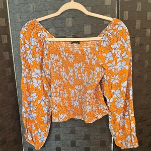 Jessica Simpson smocked Orange and Blue Floral Blouse size M EUC